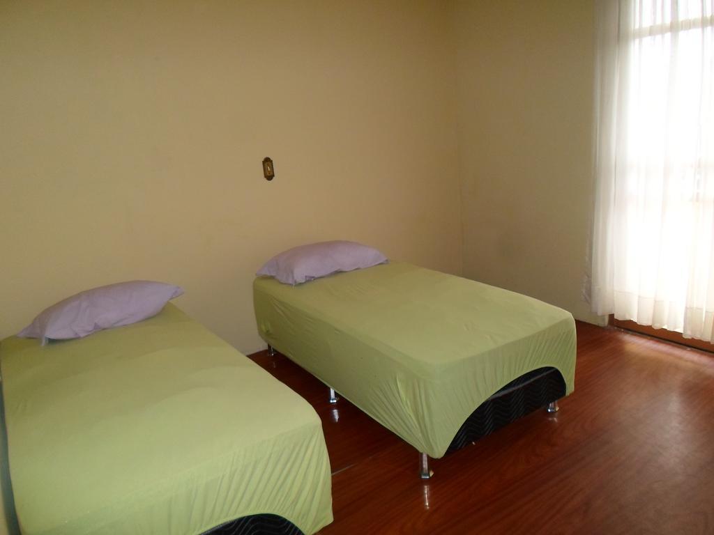 Quarto Duplo com Banheiro Compartilhado
